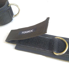 Coppia cavigliera per trazioni con anello e chiusura velcro